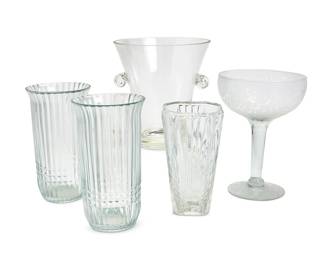 1291
A group of assorted glass table items
Late 20th/early 21st century
Most unmarked, some personalized or otherwise engraved
Comprising vases, glasses, bowls, carafes, and other vessels
23 pieces
Tallest: 14.25" H x 7.125" Dia.; Smallest vase: 4.875" H x 3.875" Dia.
Estimate: $100 - $150
