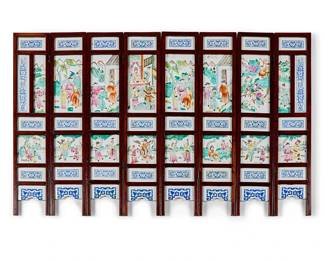 1315
A Chinese porcelain and wood eight-panel table screen
Early 20th century
Each panel with various polychrome painted scenes depicting scholars or warrior figures, alternating between blue and white foliate motif panels, joined by brass hinges
Each panel: 31" H x 6.25" W x 0.5" D; Folded: 5.75" D
Estimate: $600 - $800