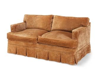 1267
A Contemporary brown velour upholstered sofa
Late 20th century
The two-seater sofa with pleated apron
30" H x 67" W x 40" D
Estimate: $200 - $300