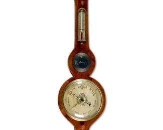 1231
An English brass-mounted mahogany veneered banjo barometer
Early 19th century
Marked: Wangler / Oxford
Featuring string inlay, with glazed instrument dials and a thermometer, surmounted by a broken swan neck pediment
30" H x 10" W x 2.5" D
Estimate: $300 - $500