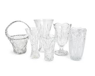 1320
A group of cut glass vases
Late 20th/early 21st century
Two marked for Waterford
Comprising two flared rim vases, two flared and scalloped rim vases, a footed vase with flared and scalloped rim, and a basket-form vase
6 pieces
Tallest: 12.125" H x 7.375" Dia.; Shortest: 8" H x 5.5" Dia.
Estimate: $300 - $500