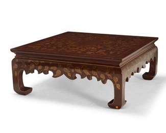1212
A Rose Tarlow Ming-style lacquered wood coffee table
Late 20th/early 21st century
With gold-toned foliate motifs on a brick red ground
20" H x 48" W x 48" D
Estimate: $200 - $300