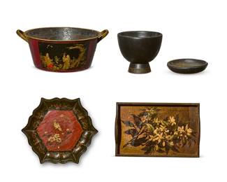 1040
A group of table articles
20th century
Tozai labeled: Made in Thailand
Comprising a two-handled wood serving tray, with an inset printed image of a spray of blossoms beneath glass (3.5" H x 17" W x 11" D), a green, red, and gilt japanned six-sided footed tray, decorated with birds and cherry blossoms (2.5" H x 15" W x 15" D), a red, black, and gilt japanned two-handled iron pot (7" H x 17" W x 14" D), a Tozai Home ebonized wood footed bowl (8" H x 9.5" Dia.), and a blackware pottery shallow bowl (1.5" H x 8" Dia.)
5 pieces
Estimate: $300 - $500