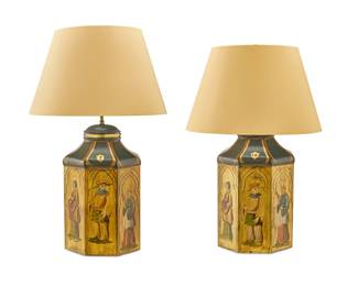 1083
A pair of tole tea cannister table lamps
20th century
Each cannister painted on three panels with figures and gilt accents, surmounted by paper shade, electrified
2 pieces
Each lamp without harp: 21.5" H x 10.5" Dia.; Each shade: 11.5" H x 19.5" Dia.
Estimate: $100 - $150