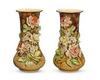 1312
A pair of French Barbotine majolica vases
20th century
Each with applied polychrome flowers on brown ground
2 pieces
Each: 22.5" H x 14" Dia.
Estimate: $200 - $300