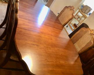 SOLD During PRE-SALE BASSETT FURNITURE Dining Room Set. The Beautiful Table has always been covered w Pads and is in Great Condition. The Table is oval-shaped, 80 inches long with one leaf that is18 inches long, 42 inches wide and 30 inches tall.
6 BASSETT Cane Back Chairs.
BASSETT Server / Buffet is 39 1/2 inches long,19 inches deep and 33 inches tall.
BASSETT China Cabinet is 58 inches wide, 16 inches deep and 79 1/2 inches tall. All 4 pieces SOLD
