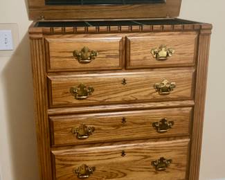 PRE-SALE: Richardson Brothers Bedroom Furniture Set includes 5 pieces.  The Long Dresser with Mirror is 64 1/2 inches wide,19 inches deep, just the base is 36 inches tall, including the mirror it is 77 inches tall.
Tall Lift Top Dresser (Hidden Jewelry Compartment) is 35 1/2 inches wide, 19 inches deep and 51 inches tall. 
The 2 Nightstands are 24 inches wide,17 inches deep and 27 1/2 inches tall.
The Queen Size 4 Post Bed is Beautiful. The Headboard & Footboard are both 64 inches wide, 52 inches tall.  All 5 Pieces $800
