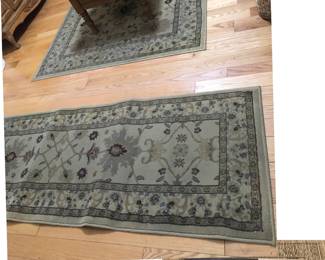 Several Sphinx Area Rugs and Runners