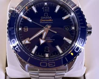 Omega Seamaster Planet Ocean 600m 43mm with sapphire case back so you can see the movement. All paperwork and inner and outer box and cards. 