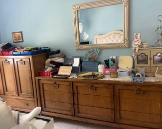 This MCM bedroom furniture is not to be missed. There are two mirrors included with this dresser along with a beautiful chest and nightstand.