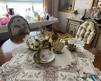 Don't miss this great shabby chic dining room table with upholstered chairs, two leaves and matching buffet server. We keep adding glass to that table in the back!!!