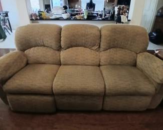 Sofa with reclining sides/foot rest