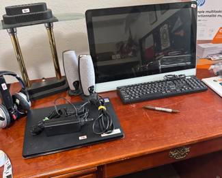 Monitor, keyboard office supplies desk laptop desk lamp computer speakers