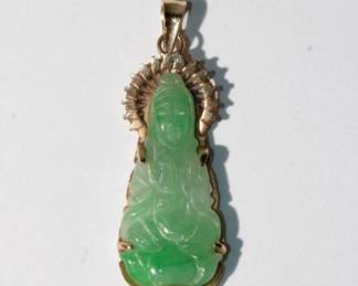 18kt yellow gold high quality green Jade Pendant that measures approx 1.25" long and features Chinese statue with gold halo and gold frame and bale, 3.1 grams total weight, comes in small black pouch