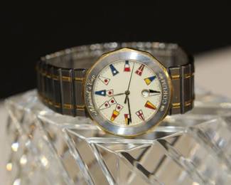 18kt Yellow Gold & Stainless Steel Men's Corum Admirals Cup Watch. 35mm. Quartz Movement 39810.21.V.52 
ref# 377707 
Two Tone Band Stainless with gold highlights, double deployment buckle. Running at time of listing, swiss made, date window at 6 o' clo