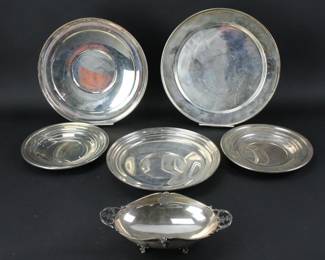 Collection of (6) sterling trays and bowls, largest 12" diameter. Approximately 56. 5 troy oz TW. Provenance: Methuen, Massachusetts estate. PLEASE NOTE: payment for silver, gold, jewelry, and coins must be made via wire transfer, cash, or certified bank check ONLY. The only exception is long-standing customers.