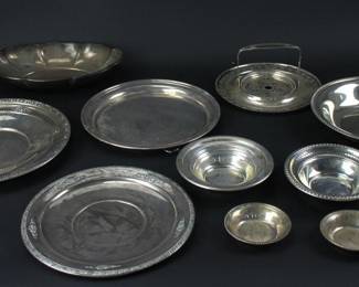 Collection of (10) sterling trays and bowls, largest 10 3/4" diameter. Approximately 57.5 troy oz TW. Provenance: Methuen, Massachusetts estate. PLEASE NOTE: payment for silver, gold, jewelry, and coins must be made via wire transfer, cash, or certified bank check ONLY. The only exception is long-standing customers.