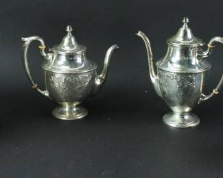 Four pieces of sterling hollowware, teapots and pitcher. Approximately 66.5 troy oz TW. Provenance: Methuen, Massachusetts estate. PLEASE NOTE: payment for silver, gold, jewelry, and coins must be made via wire transfer, cash, or certified bank check ONLY. The only exception is long-standing customers.