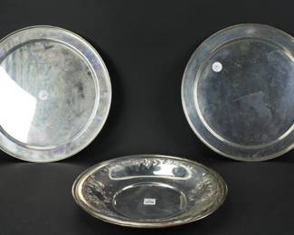 Three sterling trays, largest 14" diameter. Approximately 66.3 troy oz TW. Provenance: Methuen, Massachusetts estate. PLEASE NOTE: payment for silver, gold, jewelry, and coins must be made via wire transfer, cash, or certified bank check ONLY. The only exception is long-standing customers.