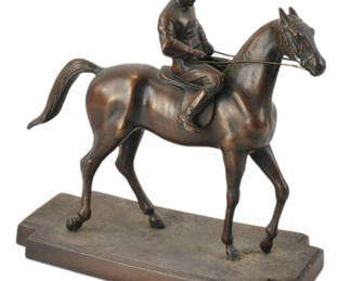 Jockey on horse, bronzed white metal, 11" x 10" x 5". Provenance: Methuen, Massachusetts estate.