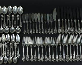 Partial service of Wallace "Grande Baroque" sterling flatware, (62) pieces total. Approximately 80.0 troy oz TW (allowing 0.5 oz for each of (10) knives with non-sterling blades). Provenance: Methuen, Massachusetts estate. PLEASE NOTE: payment for silver, gold, jewelry, and coins must be made via wire transfer, cash, or certified bank check ONLY. The only exception is long-standing customers.