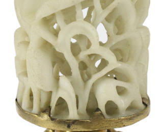 Jade carving on gold washed brass stand, 2 3/4" x 1 1/2". Provenance: Hollywood, Florida collection.