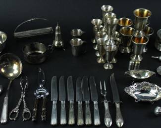 Collection of assorted sterling hollowware and flatware. Approximately 58.5 troy oz TW (allowing 0.5 oz for each of (12) pieces with non-sterling elements). Provenance: Methuen, Massachusetts estate. PLEASE NOTE: payment for silver, gold, jewelry, and coins must be made via wire transfer, cash, or certified bank check ONLY. The only exception is long-standing customers.