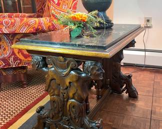 Exquisite hand carved Walnut 19th century Italian marble top end table portraying Greek mythology of the Greek God Pan. *Repair to one leg