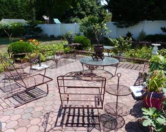 Many pieces of vintage Woodard wrought iron furniture, all with new cushions