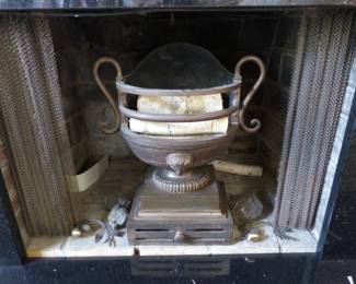 Antique cast iron fireplace urn