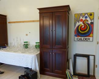 Pair of cabinets & bric-a-brac. Waterford, Lalique, Steuben, Calder framed poster