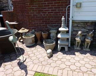 Planters, round metal table, statuary