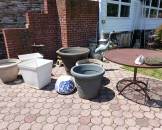 Planters, round metal table, statuary