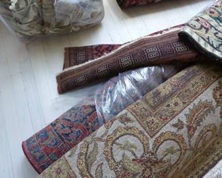 Sarouk and other area rugs, fabric bolts
