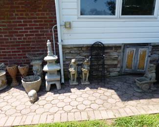 Planters, round metal table, statuary