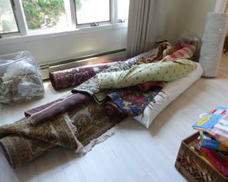 Sarouk and other area rugs, fabric bolts