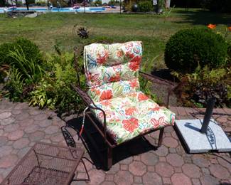 Many pieces of vintage Woodard wrought iron furniture, all with new cushions