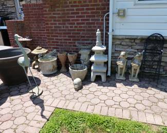 Planters, round metal table, statuary