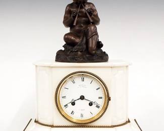 A 19th century French Bronze and Marble mantel clock by Honore Pons, Bronze work by Jean-Francois Deniere, Paris.  8-day time and strike movement with convex porcelain dial and Roman numerals marked "Deniere, ft de Bronzes, a' Paris".  White marble case with a Bronze figure of Pan, applied Brass beaded detail.  Some wear and tiny edge flakes, dial flakes and repair, flake in dial glass, running when cataloged.  15 3/4" high overall.  ESTIMATE $800-1,200