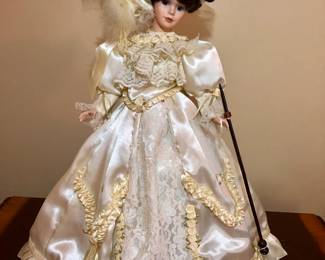 Vintage Doll with Ornate Long Dress and Hat