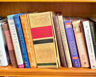 Non-fiction books including 1957 Webster's Dictionary