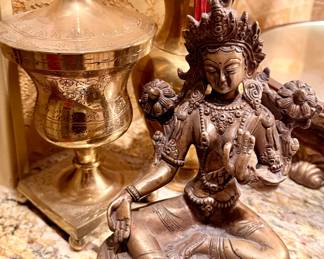 Vintage brass items including a seated Green Tara Divine Goddess statue from India