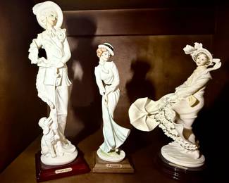 Giuseppe Armani Florence statues "Lady With Poodle", "Lady Golfer" and "Stormy Weather"