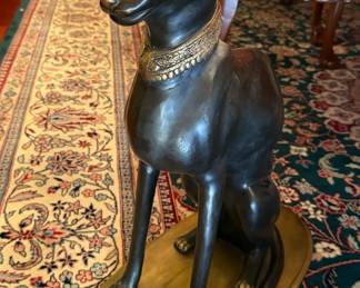 Bronze Egyptian Bastet statue with gold patina accents