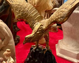 Vintage brass eagle on rocks statue