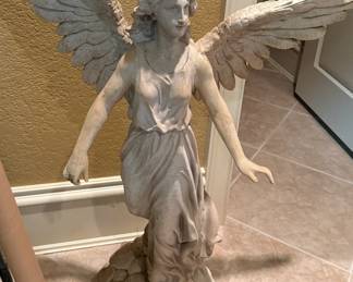 Large plaster angel statue