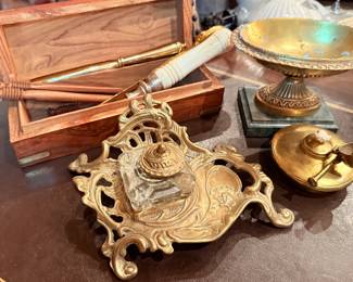 Vintage brass inkwells and desk accessories