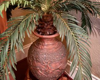 Large faux palm tree in terracotta vase