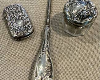 Unusual sterling silver implements 