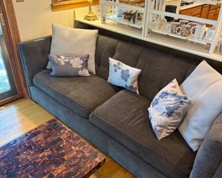 THERE ARE 2 MATCHING SOFAS IN LIKE NEW CONDITION